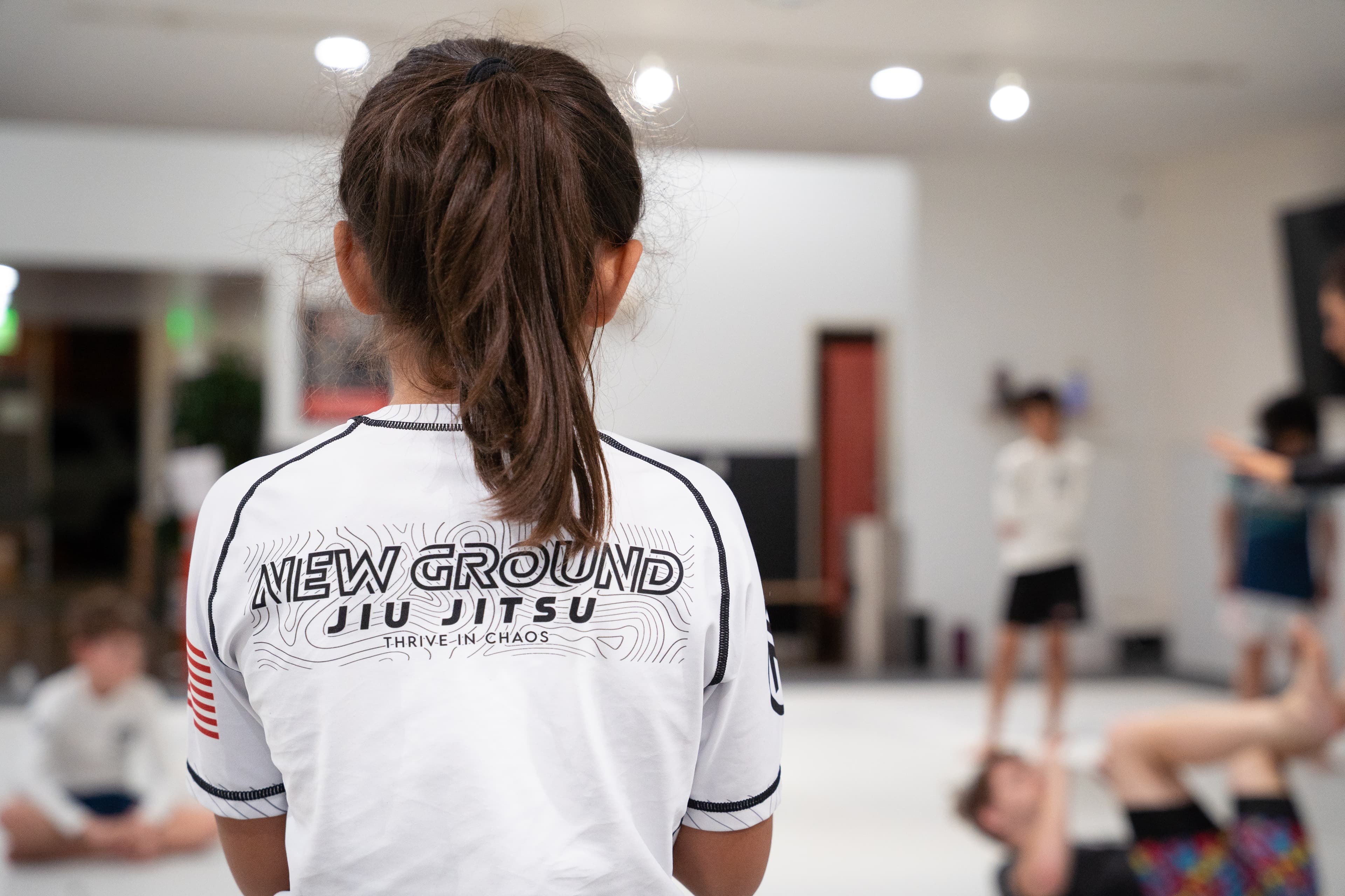 Kids learning martial arts techniques